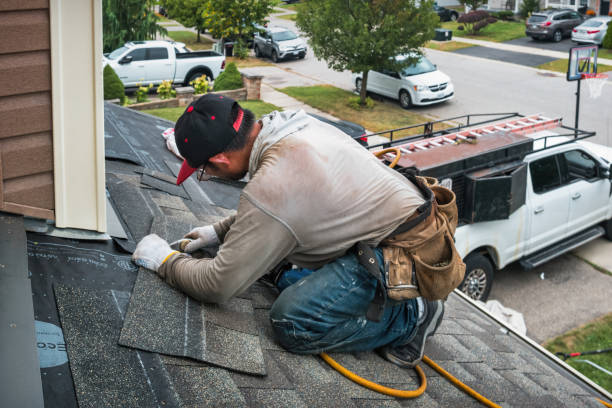 Professional Roofing technician working in Lowry, VA